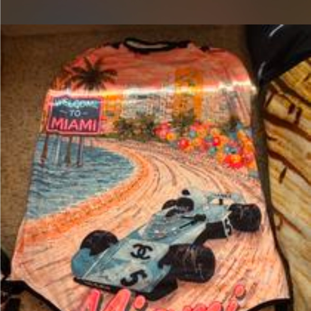 CHANEL Orange & Blue Miami Graphic luggage cover
